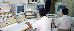 Technicians in the process control room